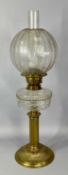 LATE 19TH CENTURY OIL LAMP, circular brass base and reeded column, clear cut glass reservoir, twin