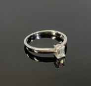 18CT WHITE GOLD EMERALD CUT SOLITAIRE DIAMOND RING, 0.25ct, ES1, colour G, size J Provenance: