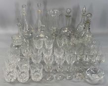 LARGE COLLECTION OF CUT GLASSWARE including drinking glasses, decanters, cheese dish, celery vase