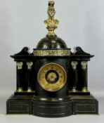 SUBSTANTIAL BLACK SLATE MANTEL CLOCK, late 19th century, the architectural case surmounted with a