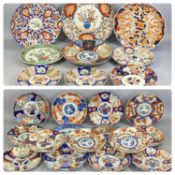 JAPANESE IMARI CIRCULAR SCALLOPED DISHES, a collection of 23 various, 34.5cms (diam.) the largest,
