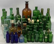 LARGE COLLECTION OF ANTIQUE COLOURED GLASS BOTTLES including green and brown poison bottles, named