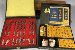 VINTAGE MAH JONG SET with composite tiles, two sets of instructions and two sets of wooden tile