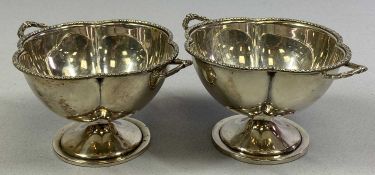 GEORGE V SILVER TWO HANDLED PEDESTAL BOWLS a pair, with gadrooned rims, Birmingham 1923, Adie