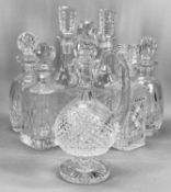 WATERFORD CRYSTAL DECANTERS, circular pair with stoppers, 33cms (h), circular pair with stoppers,