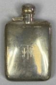 GEORGE V SILVER HIP FLASK with hinged cover, monogrammed in script, Chester 1927, Clarke & Sewell