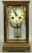 LATE 19TH CENTURY FRENCH FOUR GLASS GILT BRASS MANTEL CLOCK, white enamel dial with Arabic numerals,