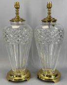 WATERFORD CRYSTAL 'BELLINE' PATTERN TABLE LAMPS a pair, of slender shouldered form, brass effect top