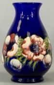 LARGE MOORCROFT PEONY BALUSTER VASE, cobalt blue ground, impressed marks and signature in script,