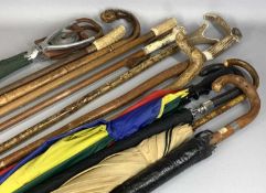 COLLECTION OF WALKING STICKS, UMBRELLAS & OTHER ITEMS including a shooting stick, some of the