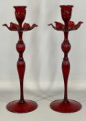 A PAIR OF VENETIAN MURANO RED GLASS CANDLESTICKS 20th century, in the manner of Salviati, with