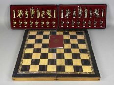 MANOPOULOS, two boxed set of chess pieces with wooden folding games board and a vintage doll '