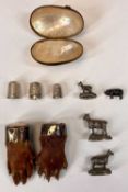 GROUP OF SMALL COLLECTABLE ITEMS including taxidermy otter's paws, silver mounted as brooches and