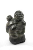 UNIDENTIFIED ARTIST, grey steatite - Mother & Child, signed in syllabics, 16cms (h) Provenance: