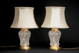 PAIR OF CUT GLASS TABLE LAMPS, beige lined cloth shades, corded switch, 36cms (h) (2) Provenance: