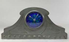 ARTS & CRAFTS CASTLE PEWTER & ENAMEL MANTEL CLOCK, the blue and green circular Arabic dial with