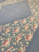 VINTAGE WELSH QUILT, decorated with red and white roses within a pale blue ground, single bed