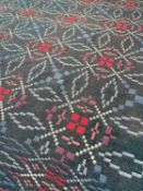 VINTAGE TRADITIONAL WELSH BLANKET with blue and red geometric design on a green ground,