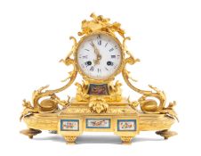 19TH C. FRENCH GILT BRONZE AND PORCELAIN MOUNTED 8-DAY MANTEL CLOCK, drum case with musical
