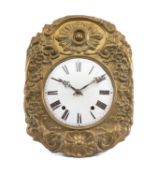 ANTIQUE FRENCH PRESSED METAL COMTOISE WALL CLOCK, enamel Roman dial in floral rococo surround,