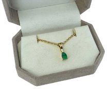 18CT GOLD EMERALD & DIAMOND DROP PENDANT, the pear cut emerald (0.35ct approx.) below a single round