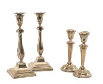 TWO PAIRS SILVER CANDLESTICKS, comprising George V pair, Thomas Bradbury & Sons, Sheffield 1915,