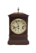 SEWILLS OF LIVERPOOL MAHOGANY MANTEL CLOCK, casket top with acorn finial, pierced brass panel sides,