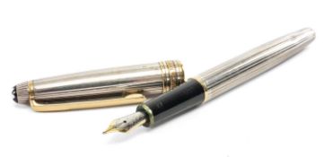 MONTBLANC SILVER 'QUO VADIS' FOUNTAIN PEN, stamped 925, vertical reeded design, gilt bands and clip,