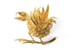 BOUCHERON 18CT GOLD BIRD BROOCH, modelled as skylark ruffling her feathers perched on a branch, ruby