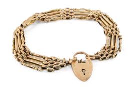 YELLOW METAL GATE LINK BRACELET, heart shaped padlock, 17.0gms Provenance: private collection