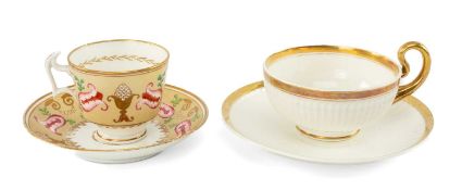 TWO SWANSEA PORCLEAIN CUPS & SAUCERS, comprising French fluted breakfast cup and saucer with gilt