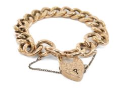 9CT GOLD CURB LINK CHAIN, engraved heart shaped padlock and links, 24.3gms Provenance: private