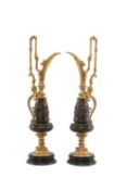 PAIR PARCEL GILT METAL EWERS, modelled in the Renaissance taste, 53cms (h) Provenance: deceased