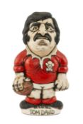 THE RUGBY UNION CLUB HOUSE: GROGG MODEL OF TOMMY DAVID BY JOHN HUGHES standing on titled base Tom