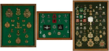 THE MILITARY CLUB HOUSE: REGIMENTAL BADGES including lapel and uniform badges, mounted on green
