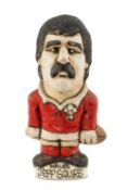 THE RUGBY UNION CLUB HOUSE: GROGG MODEL OF JEFF SQUIRE BY JOHN HUGHES standing on titled base,