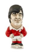 THE RUGBY UNION CLUB HOUSE: WORLD OF GROGGS MODEL OF BARRY JOHN wearing Wales kit and standing on