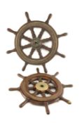 THE MARITIME / MARINE / NAVAL CLUB HOUSE: TWO EARLY 20TH CENTURY SHIPS WHEELS, comprising smaller