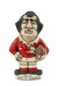 THE RUGBY UNION CLUB HOUSE: GROGG MODEL OF SIR GARETH EDWARDS BY JOHN HUGHES standing on titled