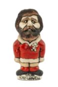 THE RUGBY UNION CLUB HOUSE: GROGG MODEL OF RAY GRAVELL BY JOHN HUGHES standing on titled base,