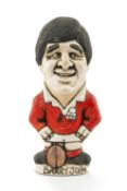 THE RUGBY UNION CLUB HOUSE: GROGG MODEL OF BARRY JOHN BY JOHN HUGHES standing on titled base Barry