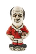 THE RUGBY UNION CLUB HOUSE: GROGG MODEL OF TERRY COBNER BY JOHN HUGHES standing on titled base,