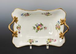 SWANSEA PORCELAIN TWIG HANDLED DISH circa 1815-1820, decorated with flower sprays, rim and handles