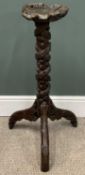BLACK FOREST STYLE CARVED TRIPOD TORCHERE of naturalistic form, 81 (h) x 26 (w) x 22cms (d)