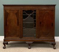 MAHOGANY THREE DOOR BOOKCASE with glazed centre, raised on cabriole supports, 132 (h) x 155 (w) x