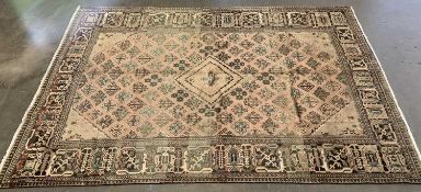 EASTERN JOSHAGAN RUG, beige ground with central repeating diamond pattern and surround border, 330 x