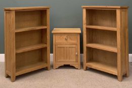 MODERN LIGHT OAK BOOKCASES a pair, labelled 'Julian Bowen', 120 (h) x 80 (w) x 30cms (d) and a