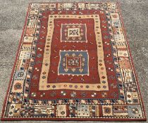 BELGIAN GEOMETRIC PATTERNED RUG, red ground with sectional pattern border, 290 x 202cms