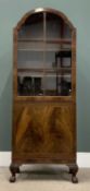 20TH CENTURY MAHOGANY BOOKCASE CUPBOARD, dome top, upper glazed door on ball and claw feet, 107 (
