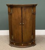 19TH CENTURY OAK CORNER CABINET, a fine bow front example with brass H hinges and three small base
